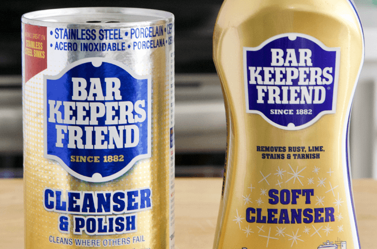 A container of Bar Keepers Friend powdered cleanser and polish and a bottle of Bar Keepers Friend liquid soft cleanser