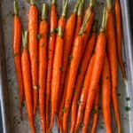 Roasted carrots on a baking sheet