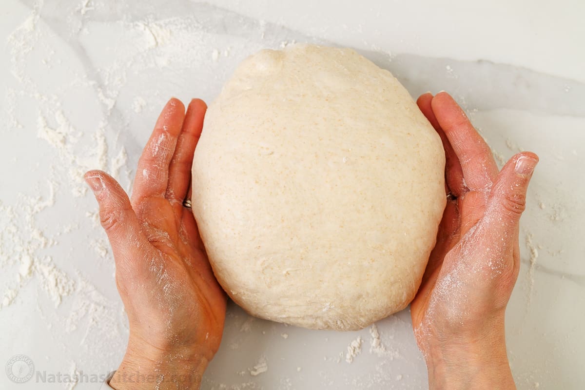 tightening the boule to make this easy sourdough recipe