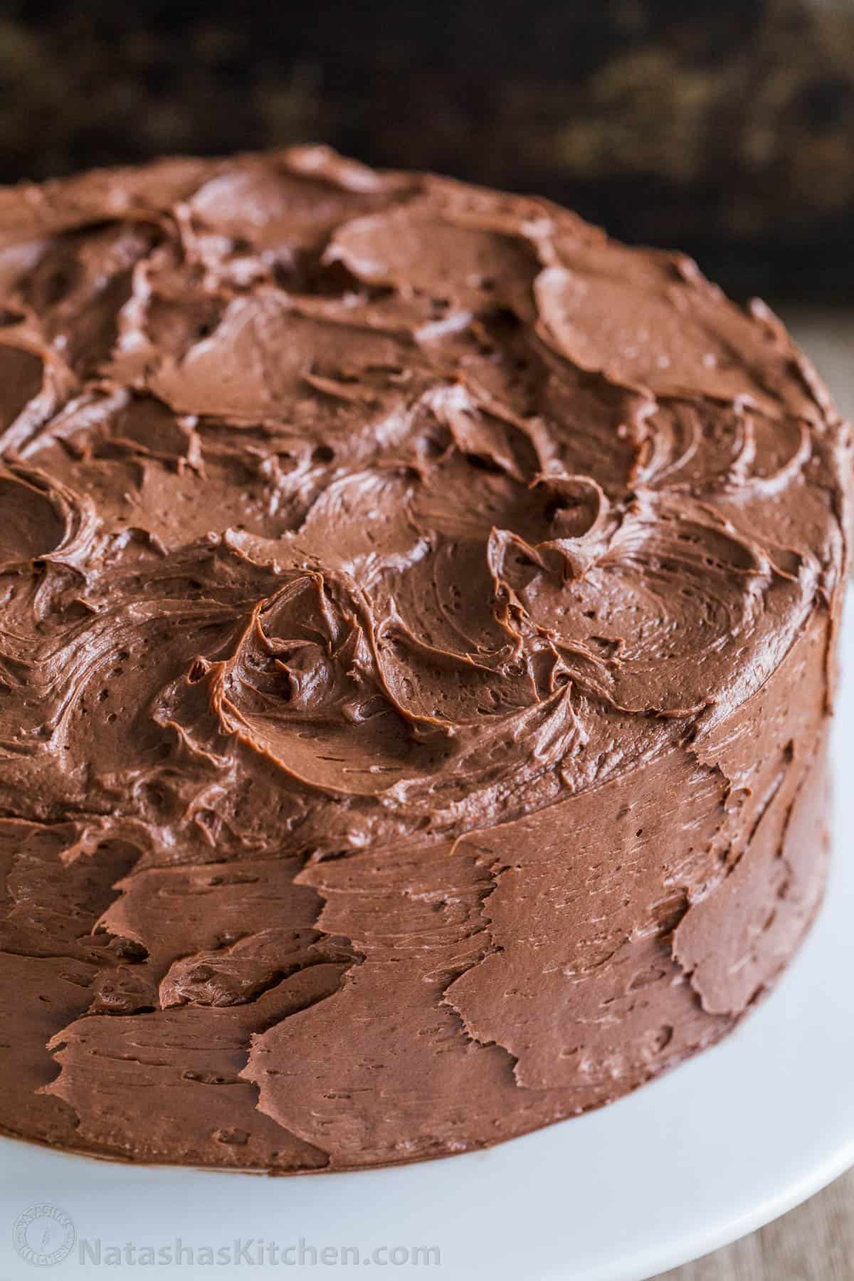 Swirled frosting on chocolate cake 