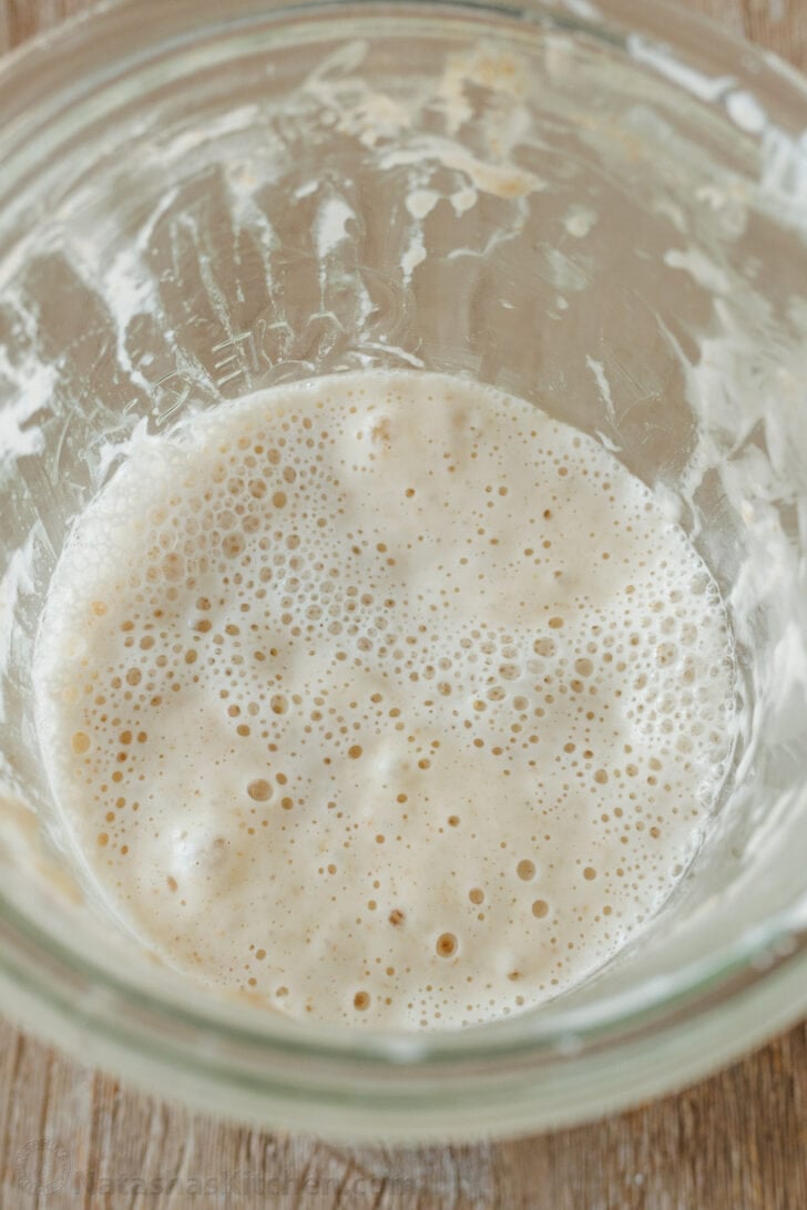 Bubbling inside sourdough starter jar