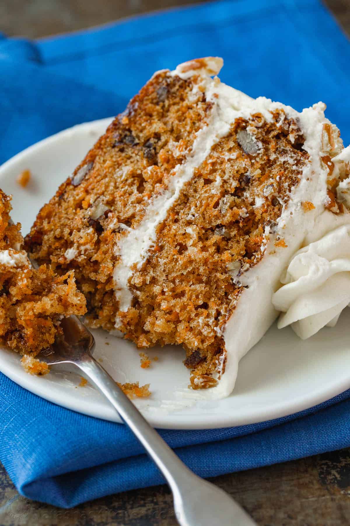 Slice of Carrot cake on a plate with a fork