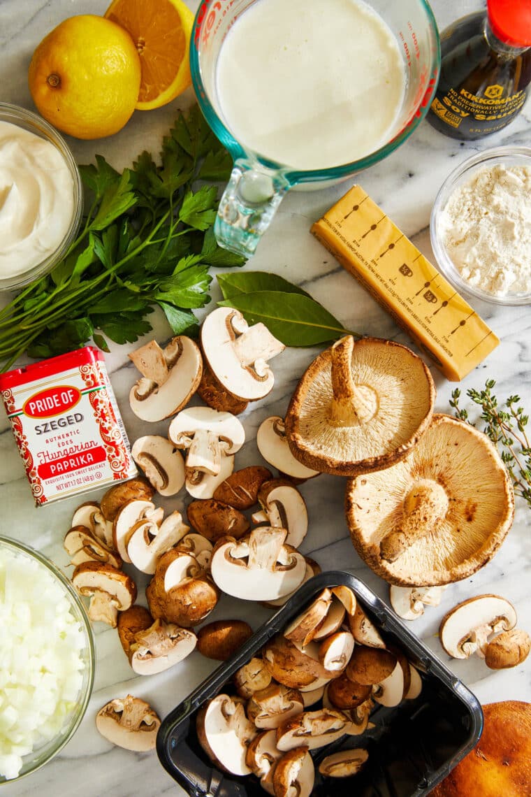 Hungarian Mushroom Soup - The creamiest mushroom soup with fresh dill, thyme, and paprika. Top with a dollop of sour cream and crusty bread!