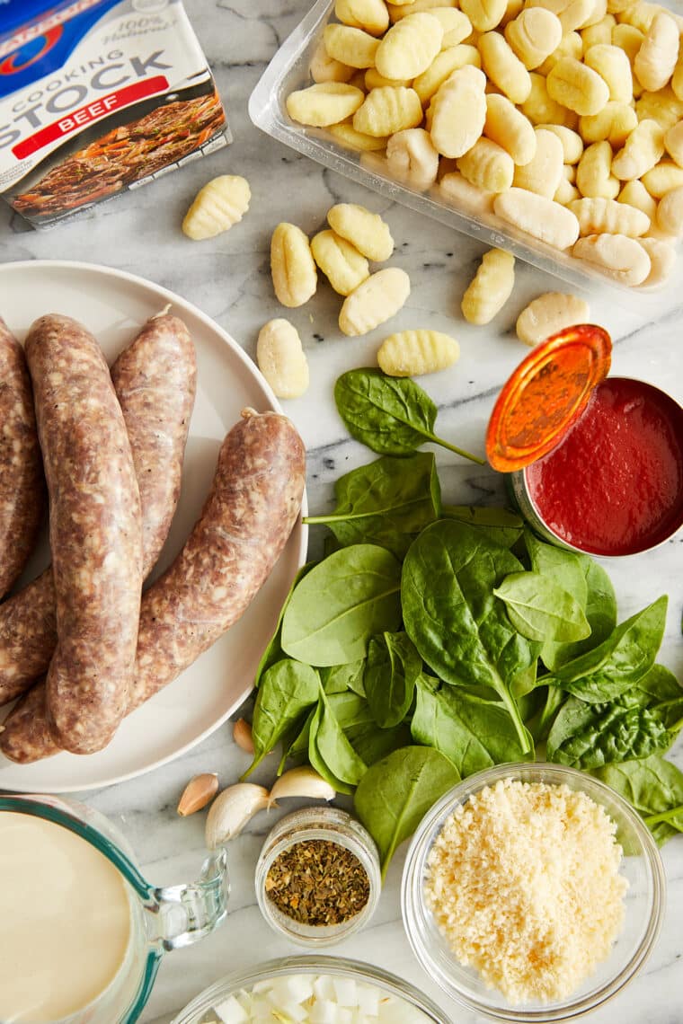 Creamy Sausage Gnocchi - A quick 30 min ONE POT meal! With crumbled Italian sausage, sneaked in spinach and the best tomato cream sauce ever!