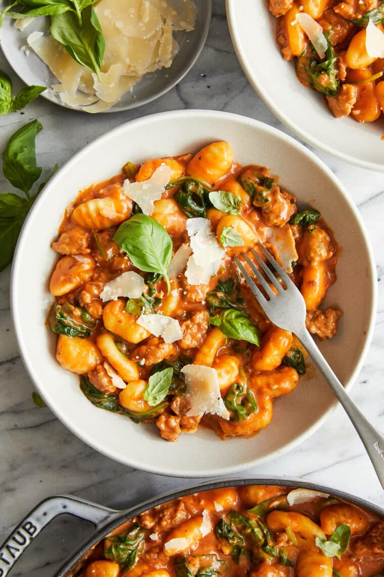 Creamy Sausage Gnocchi - A quick 30 min ONE POT meal! With crumbled Italian sausage, sneaked in spinach and the best tomato cream sauce ever!