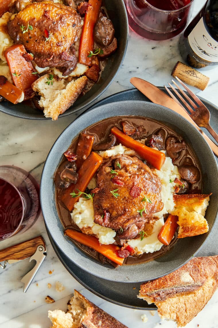 Instant Pot Coq Au Vin - Oh-so-perfect silky-tender chicken and veggies cooked in a red wine sauce in just a fraction of the time. SO GOOD!