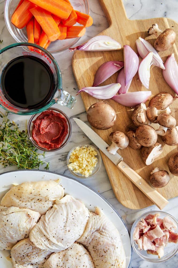 Instant Pot Coq Au Vin - Oh-so-perfect silky-tender chicken and veggies cooked in a red wine sauce in just a fraction of the time. SO GOOD!