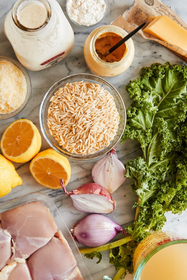 One Pot Lemon Chicken and Orzo - Golden brown, juicy chicken with the creamiest lemony orzo + sneaked in greens, all made in ONE SINGLE POT!