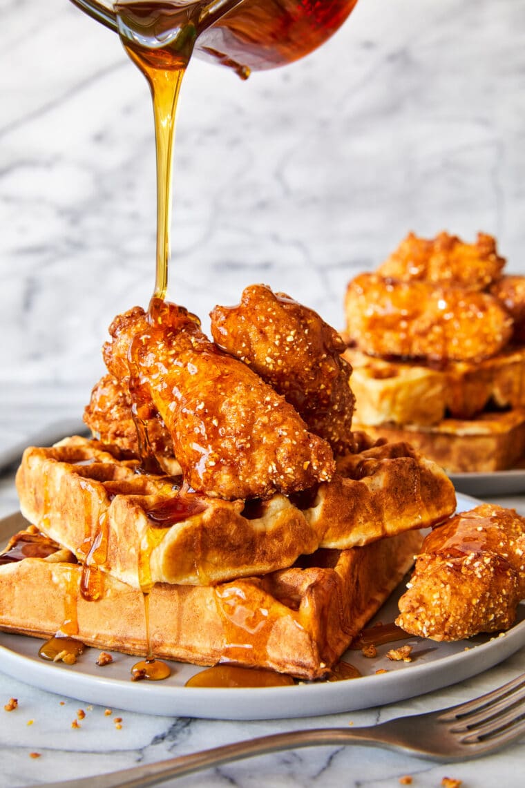 Honey Fried Chicken and Waffles - Super crispy fried chicken, drizzled with a warm honey glaze, served with the fluffiest buttermilk waffles!