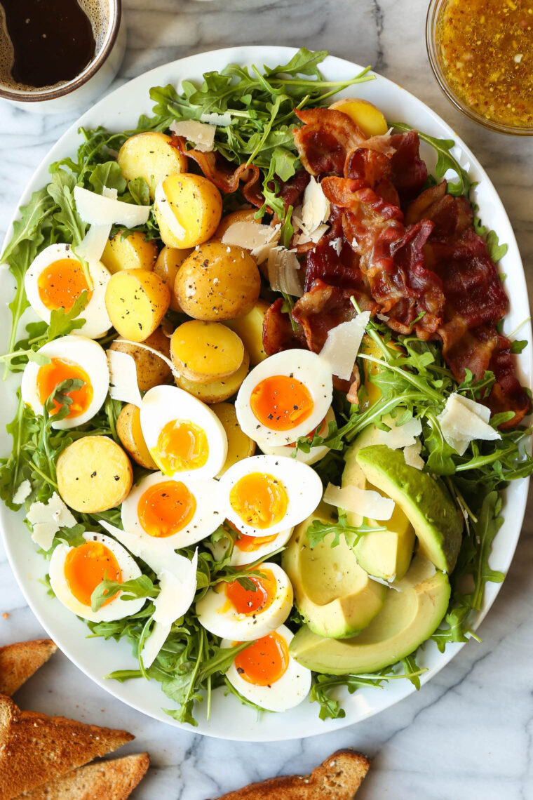 Breakfast Salad - A breakfast worth waking up for! With fresh greens, crispy bacon, jammy eggs, and a zesty, tangy mustard vinaigrette!