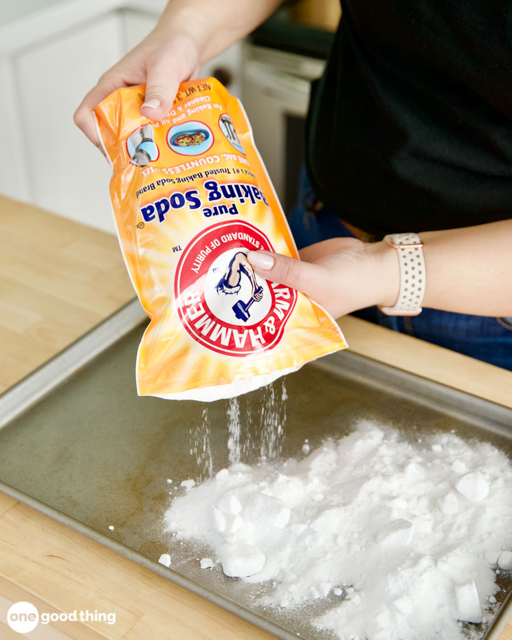 To make DIY washing soda, put baking soda on a sheet pan.