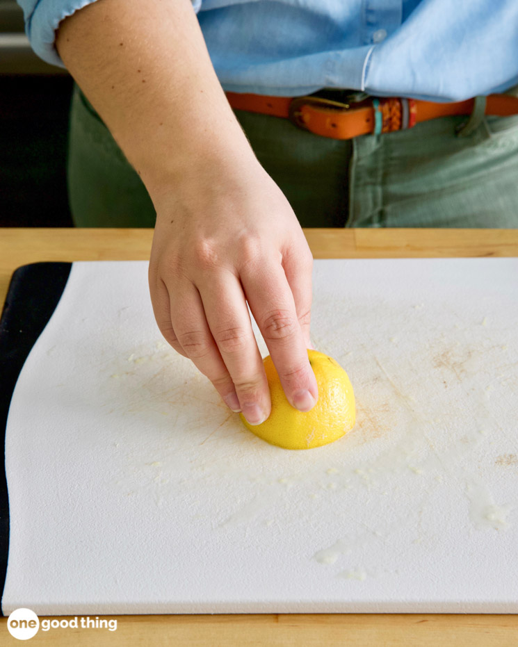 Use half a lemon, peel and all, with salt to remove stains from plastic cutting boards.