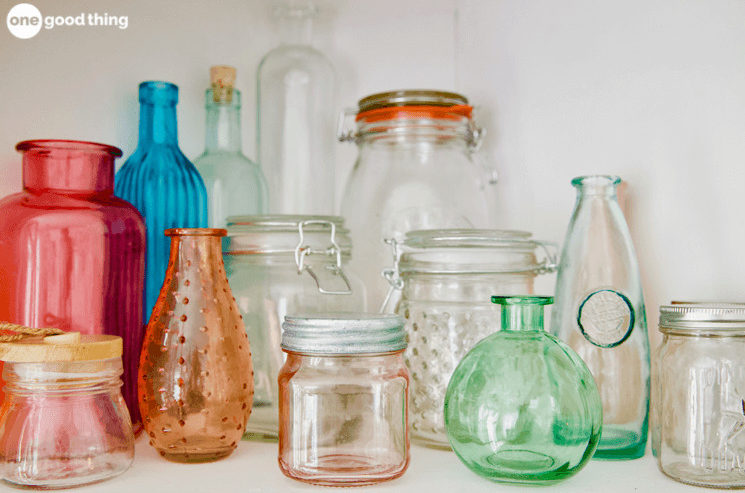 collection of glass bottles on a shelf