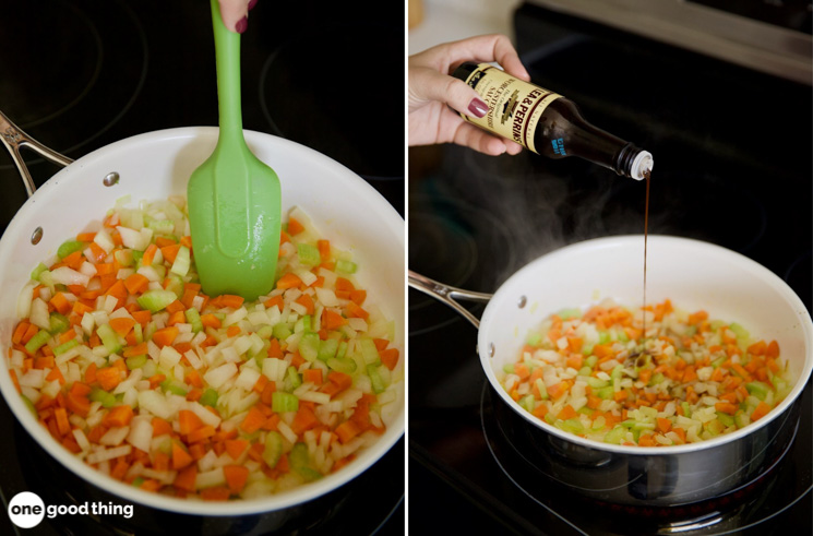 carrots, celery, and onions cooking in white skilled with green spoon stirring/hand pouring Lee & Perrins sauce into sauted veggies