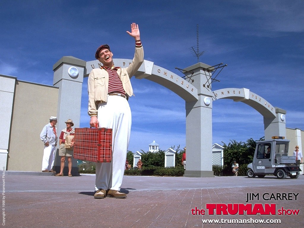 Jim Carrey mentre saluta in The Truman Show